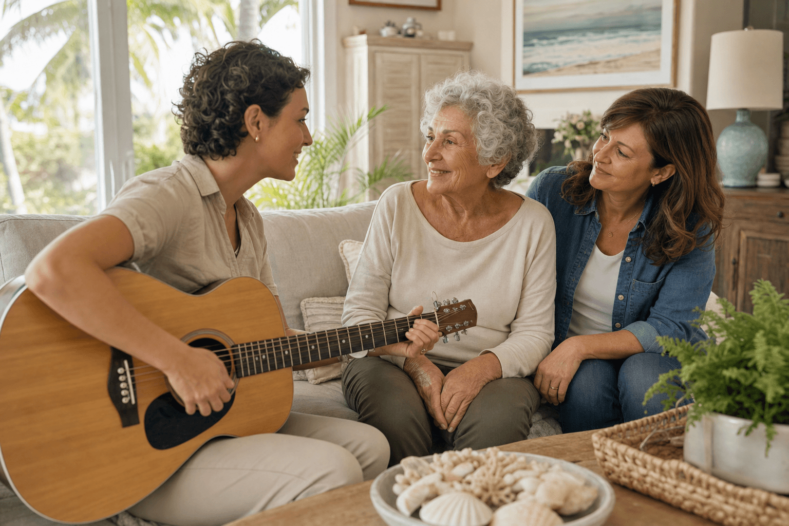 Music therapist playing guitar with a hospice patient and family member at home