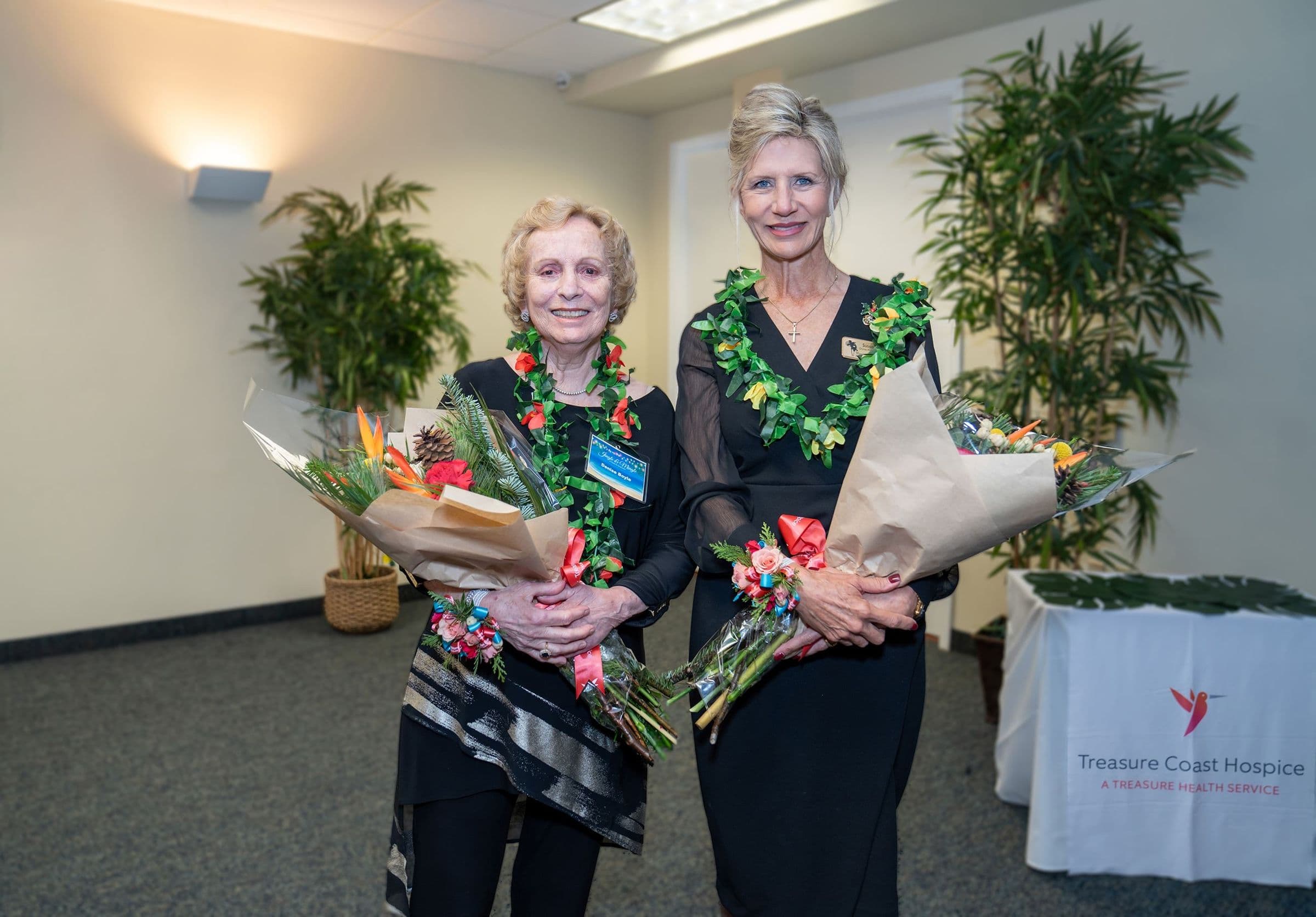 Thanks for Giving honorees Denise Boyle and Susan King holding bouquets at the recognition event