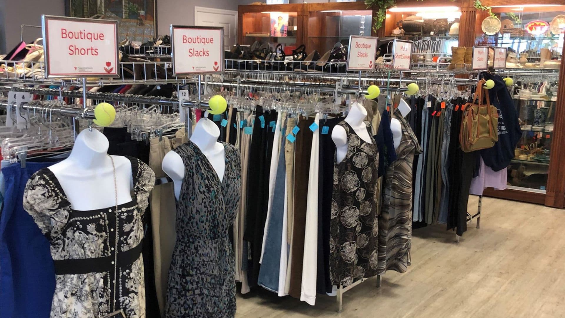 Clothing racks and boutique displays inside Stuart Thrift Boutique